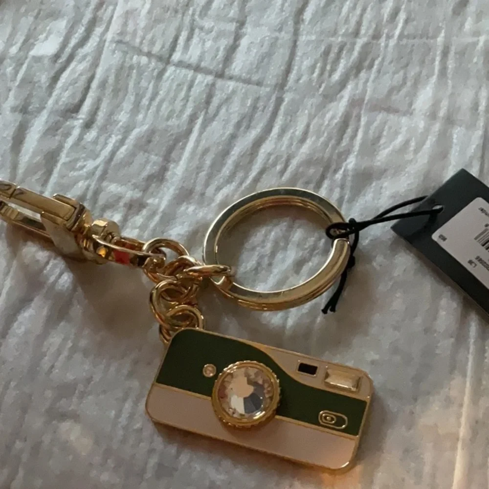 Kate spade ♠️ Gold and Green Camera Keychain